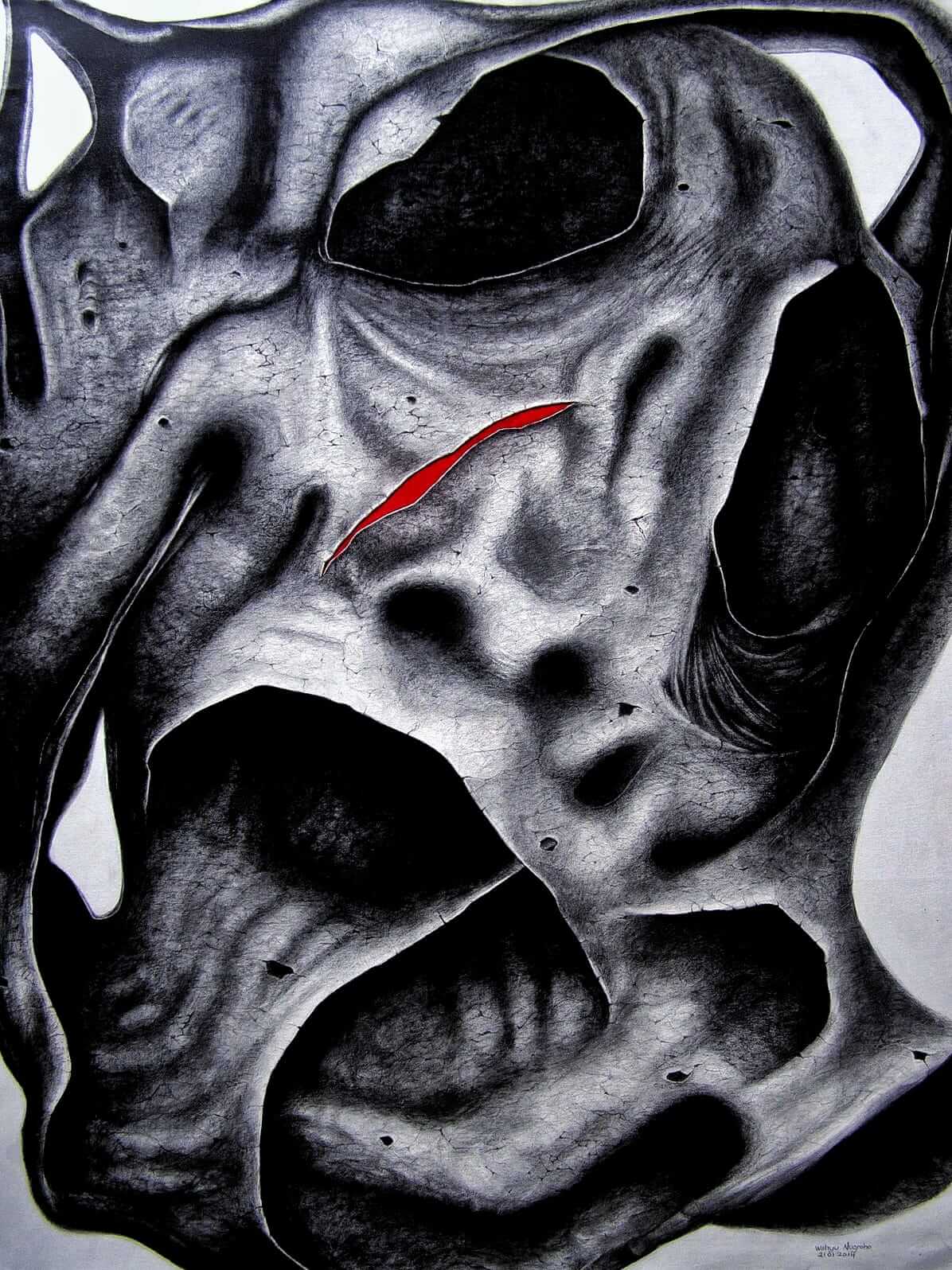 Close up of a cracked abstract grayscale sculpture surface with a single red streak in the center