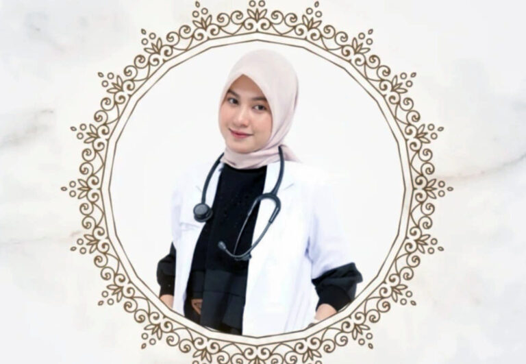Female doctor in a white coat with a stethoscope, wearing a hijab, posed inside an ornate circular frame.