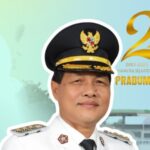 Portrait of a man in a white ceremonial uniform and gold trimmed peaked cap outlined in white with a festive backdrop celebrating prabumulihs 24th anniversary 20012025