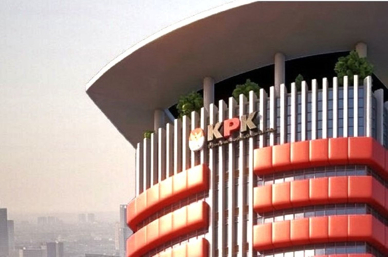 9fkpk catrawarta Modern office building with vertical columns and red curved accents displaying the letters kpk on the facade