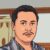 Illustrated portrait of a man with short dark hair and light facial hair wearing a patterned shirt indoors, facing the camera.