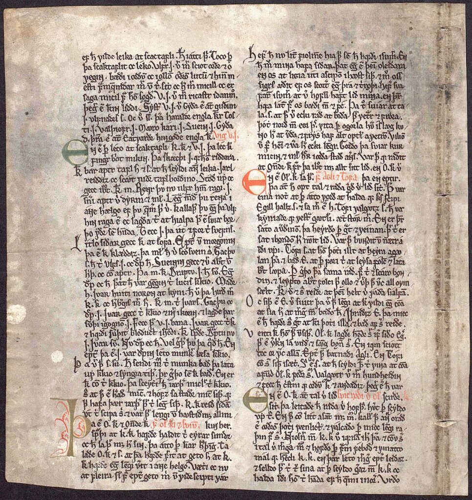 Lbsfragm820001v1 catrawarta Two column medieval manuscript page with dense black script and green and red illuminated initials